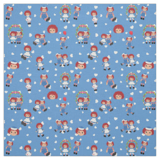 Tecido Raggedy Ann e Andy em Corações Caindo em Azul