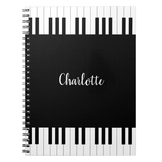 Teclado de piano, caderno preto e branco (Frente)