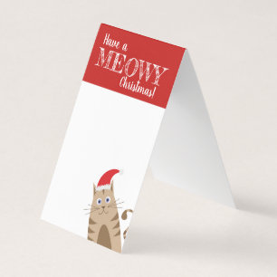 Tenha um gato engraçado com papais noeis de natal 