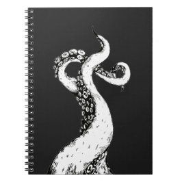 tentáculos de polvo em caderno preto com espiral