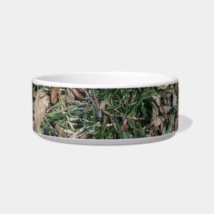 Tigela grama verde e folhas