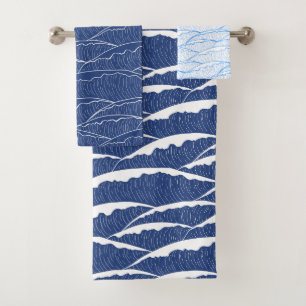 Toalha azul com padrão de ondas ilustrativo