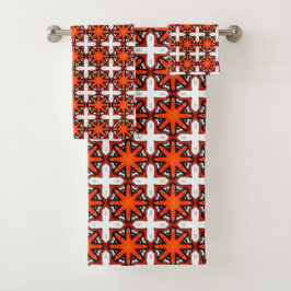 Toalha com padrão geométrico vermelho e laranja