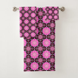 Toalha com padrão geométrico vibrante rosa e roxo