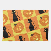 Toalha de cozinha com jack-o'-lantern e gato.
