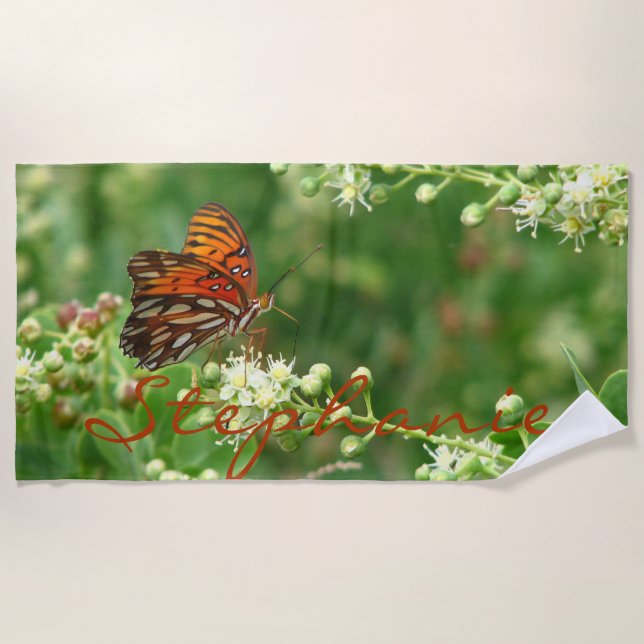 Toalha de praia alaranjada da borboleta com nome (Frente)