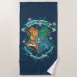 Toalha De Praia Crista Floral de HOGWARTS™<br><div class="desc">HARRY POTTER™ | Confira esta ilustração floral do Brasão de HOGWARTS™!</div>