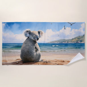 Toalha De Praia Koala em uma praia arenosa