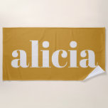 Toalha De Praia Modern Typography Personalized Name Mustard Yellow<br><div class="desc">A chic personalized design with a large lowercase name in bold white serif type on a warm earthy mustard yellow background. Clean, modern, and easy to spot at the pool or beach. Customize with any name for a simple look that feels classic and elevated. Great for vacations, lake days, swim...</div>