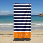 Toalha De Praia Monograma de faixas de laranja e Marinho<br><div class="desc">Esta toalha de praia personalizada tem um padrão de stripe horizontal pré-definido em azul marinho, laranja e branco. Personalize-o com seu nome monograma ou outro texto personalizado em uma fonte serif moderna. Use as ferramentas de design para escolher qualquer cor de fundo, editar as fontes de texto e as cores...</div>