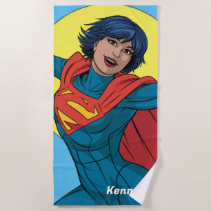 Toalha De Praia Supergirl voando com roupa azul