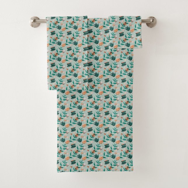 Toalhas com um padrão floral azul-verde pendem  (Criador carregado)