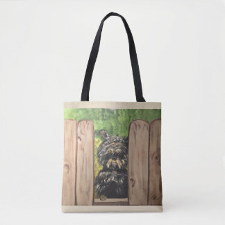 Tote O bolsa com o cão bonito que espreita entre slats