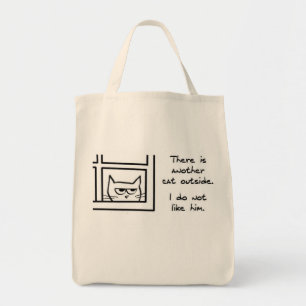 Tote O gato irritado vê um outro gato - o bolsa