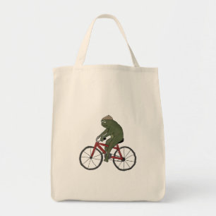 Tote Sapo cavalheiro em uma bolsa de bicicleta
