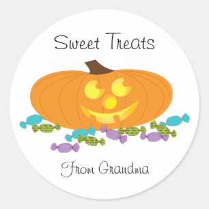 Tratamentos doces do Halloween com um adesivo de a