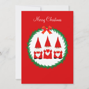 Três gnomos de Natal em vermelho