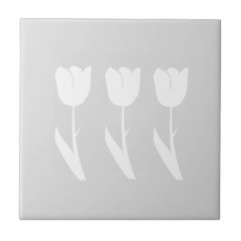 Três tulipas em cinzento e em branco