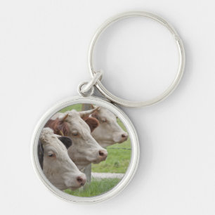 Três Vacas em um Chaveiro de Linha