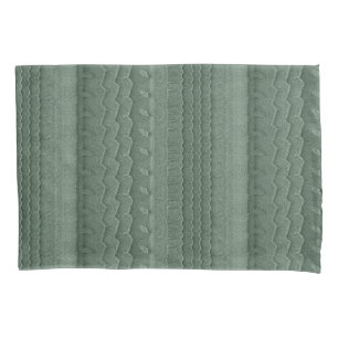 Trilhas do pneu de carro no verde da cerceta da