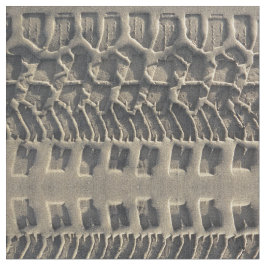 Trilhas do pneu no tecido da foto da areia da