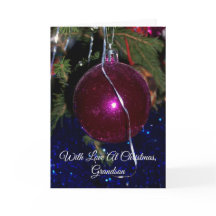 Um Bauble do cartão do neto do Natal feliz