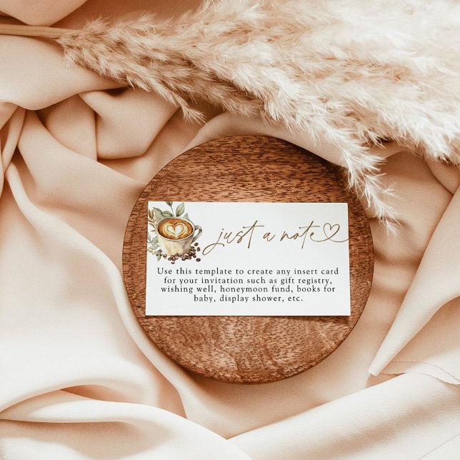 Um bebê está a criar apenas um cartão de nota, caf (Criador carregado)