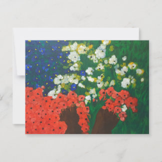 Um bebê no cartão postal do jardim