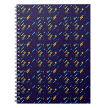 Um caderno espiral com capa azul escura 