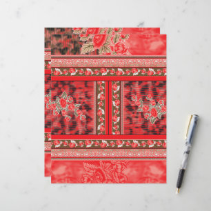 um design floral vermelho e verde num fundo preto