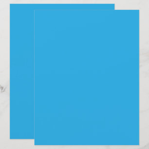 um fundo azul com um gato preto e branco