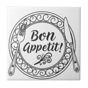 Um letreiro decorativo bon appetit com garfo e fac