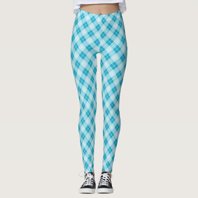 Um modelo apresentando leggings de cintura alta (Frente)