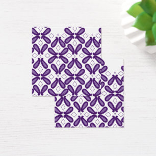 Um padrão simétrico com m branco e roxo