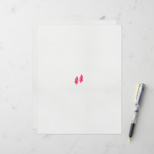um par de folhas vermelhas sobre fundo preto