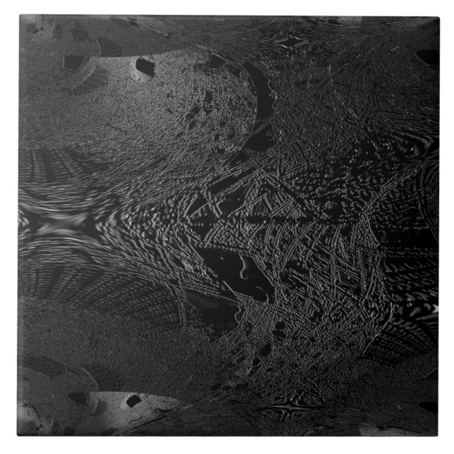 Um pedaço de cerâmica negra escura com um espaço e (Frente)