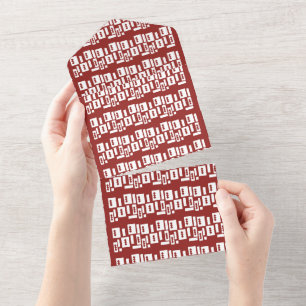 Um tapete vermelho com padrão texturizado é espalh