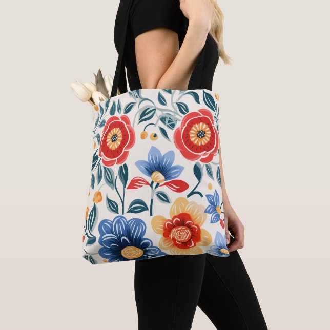 Uma bolsa de mão com alças pretas apresenta uma co (Close Up)