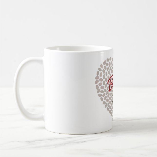 Uma caneca de café dizendo "você foi o mundo para  (Esquerda)