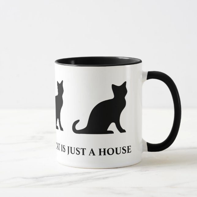 Uma casa sem um gato, só uma caneca de café. (Direita)