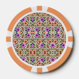 Uma ficha de pôquer com um padrão floral intrincad