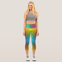 Uma pessoa vestindo legging vibrante com gradiente