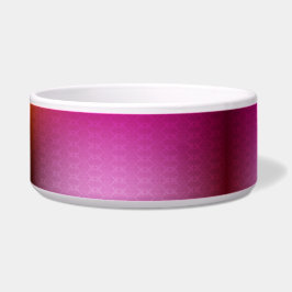 Uma tigela de cerâmica com um vibrante rosa e verm