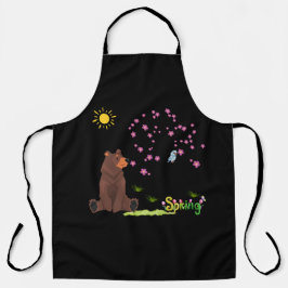 Urso observa a árvore florescente e a ave