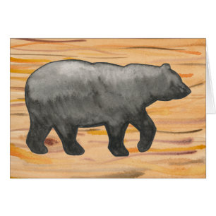 Urso preto no cartão de madeira