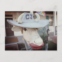 Vaca no batom em um cartão