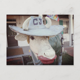 Vaca no batom em um cartão