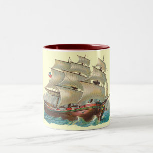 Vela do navio do vintage através da caneca azul do