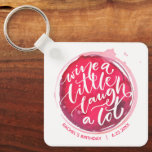 Vinho Um Pequeno Chaveiro<br><div class="desc">O Round chaveiro apresenta texto divertido "Wine a Little Laugh A Lot" em uma mancha de vinho tinto - personalizado com qualquer informação. Chaveiros fazem presentes memoráveis para familiares e amigos ou criam por si mesmos.</div>