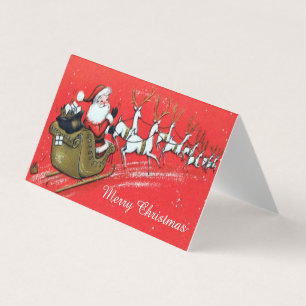 Vintage Santa Claus em seu Sleigh com Reindeer